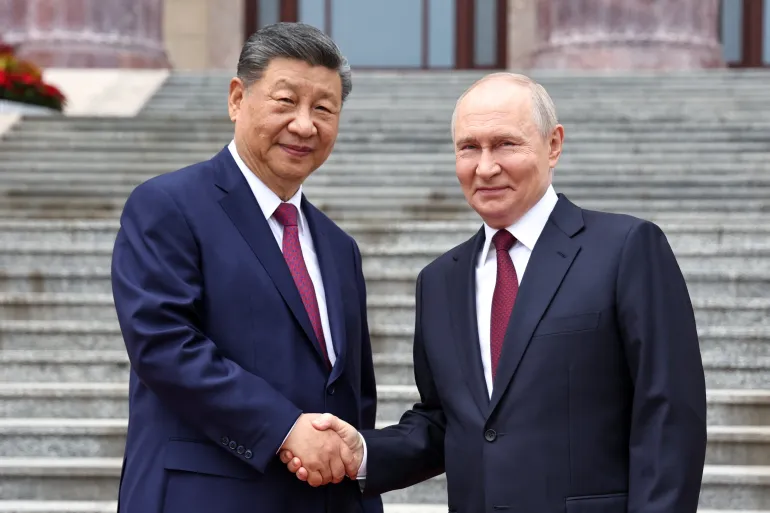 2026-05-20T051605Z_205404029_RC2TCLAQZ57W_RTRMADP_3_CHINA-RUSSIA-1779256314